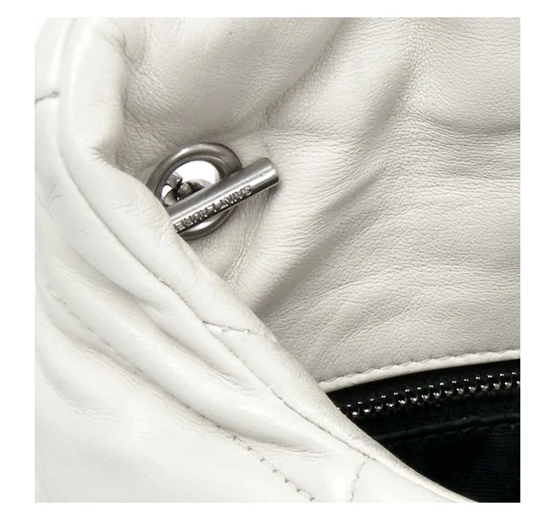 לאחר צביעת תיק עור של איב סן לורן בהיר אבזם רצועה