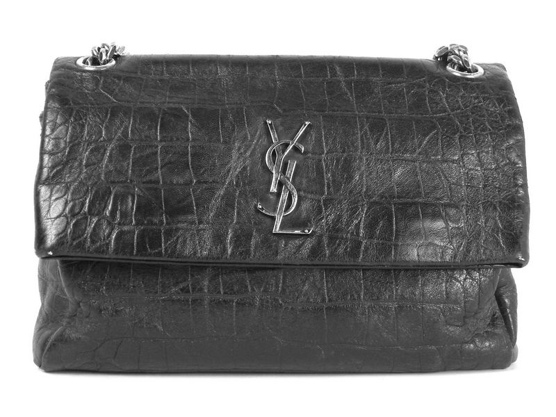 תמונה לפני תיקון קרע בעור לתיק איב סן לורן