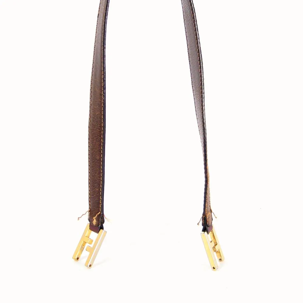 Leather strap reassembled before final hand stitching on a Fendi bag